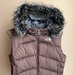 North face 550 Puffer Vest with detachable hood.